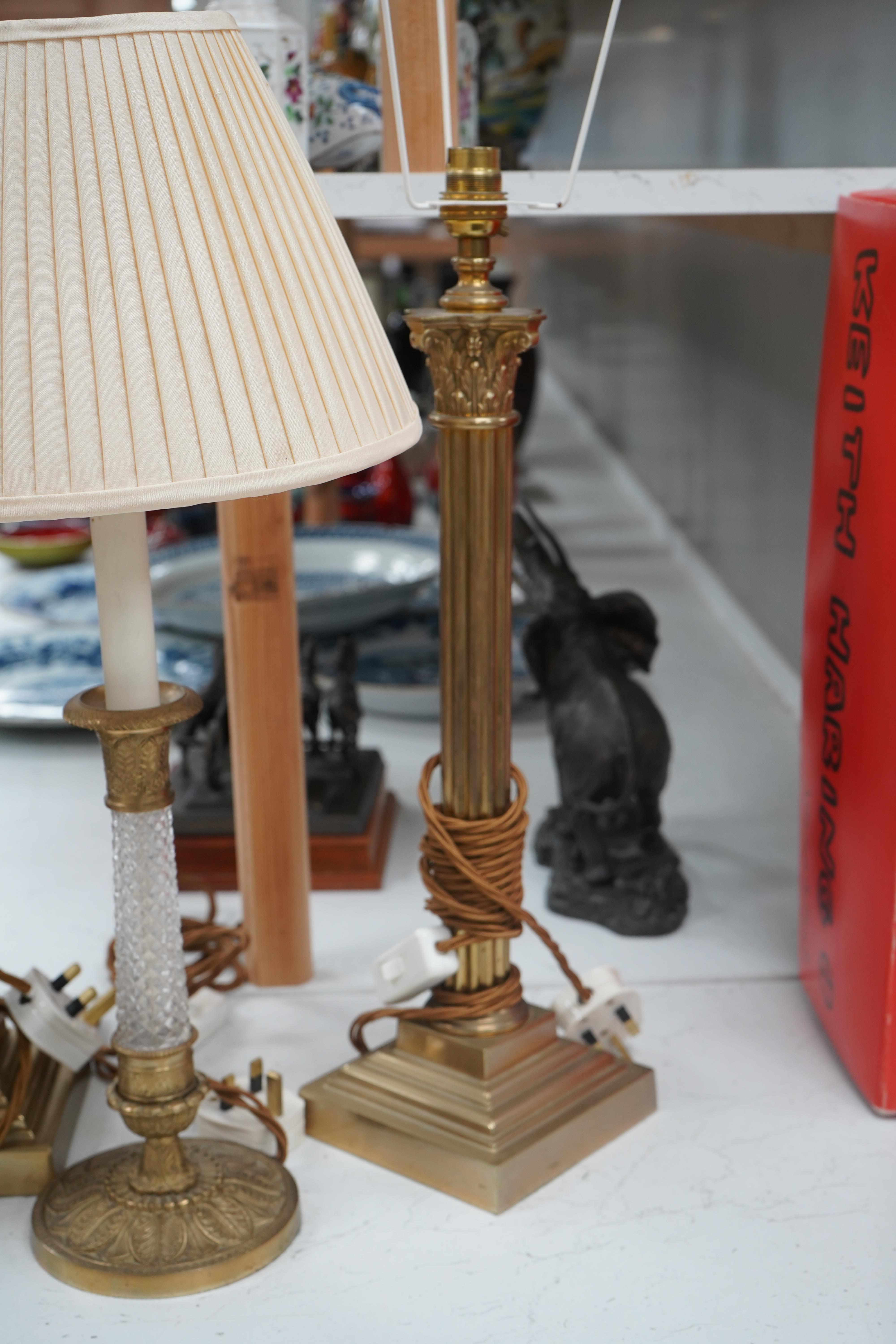 A pair of brass Corinthian column table lamps and another brass and glass pair, tallest 41.5cm. Condition - good, not tested